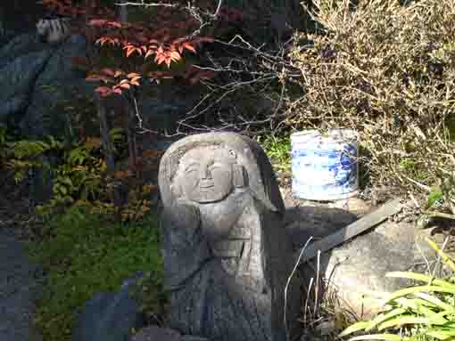 a small statue of Buddha in Zentokuji